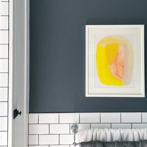 Framed yellow and pink abstract print